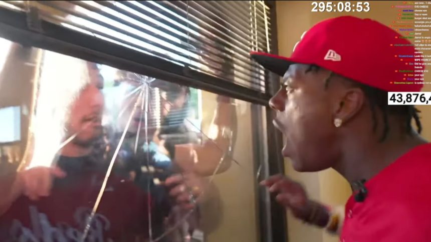 IShowSpeed panics after learning he's stuck in an elevator.