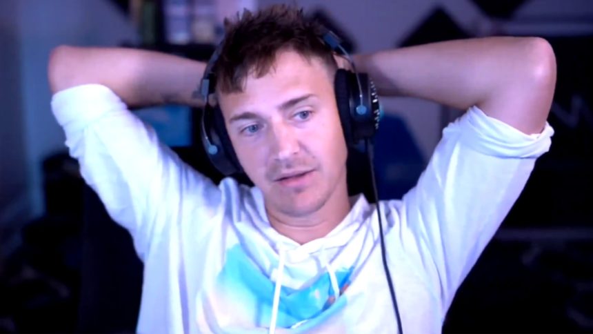 Ninja seeming distressed against a background of dollar signs.