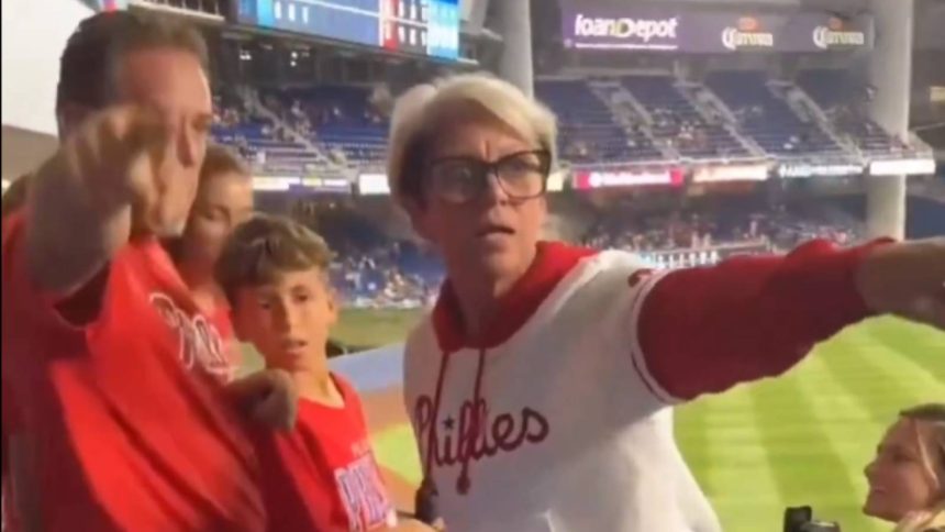 Julia Hill running onto baseball field and being arrested by police