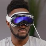 MKBHD holding Apple AirPods Pro 3 in hand