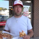Dave Portnoy doing a pizza review and a Smoke and Stack with their backs turned in Sinners