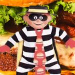 food being dipped into salsa pot with sauce