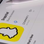 Snapchat logo on yellow background