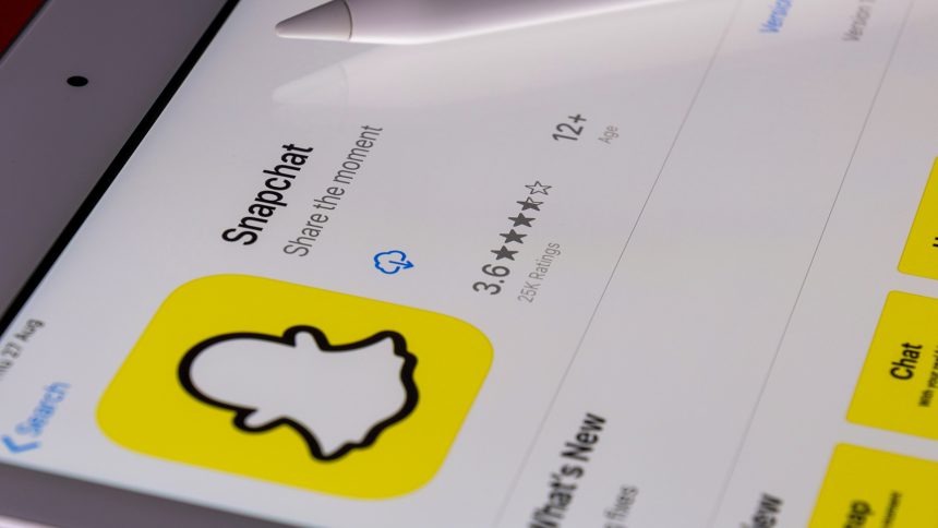 Snapchat logo on yellow background