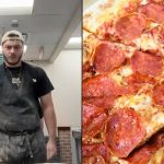 Woman biting into a sandwich while squinting her eyes