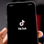 youtube logo surrounded by money