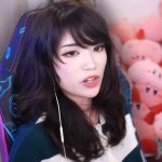 Pokimane and LilyPichu sat on couch talking into microphones