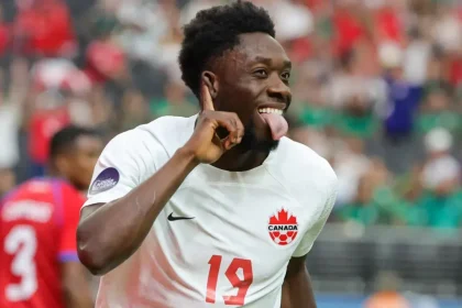 Why isn't Alphonso Davies playing for Canada vs. Australia in the international friendly?
