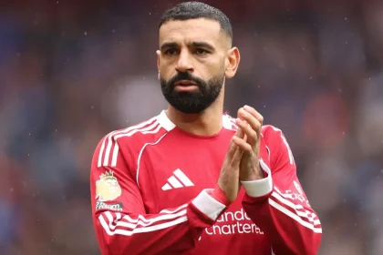 Why isn't Mohamed Salah playing for Liverpool against Eintracht Frankfurt in the Champions League match?
