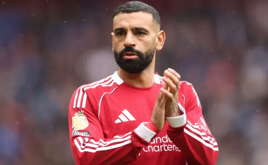 Why isn't Mohamed Salah playing for Liverpool against Eintracht Frankfurt in the Champions League match?