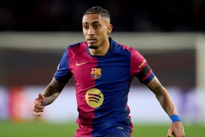 Why isn't Raphinha playing for Barcelona against Olympiacos in UEFA Champions League?