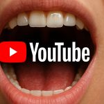 youtube logo surrounded by money