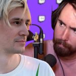 Kai Cenat in pink outfit with hands to the side side-by-side with xQc staring at camera