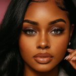 Ticketmaster logo displayed on floor with feet walking around it