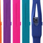 Man with glasses sat scrolling on iphone