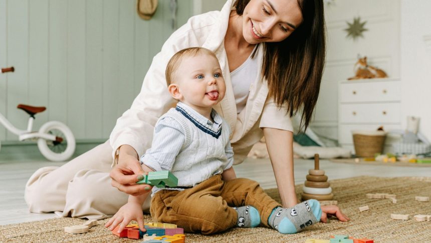 A cute baby looks sideways.