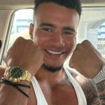 Dancingmoto riding motorbike alongside police car sirens