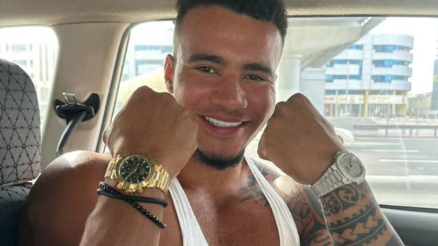 Dancingmoto riding motorbike alongside police car sirens