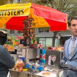 MatPat speaks at a public gathering in front of Congress.
