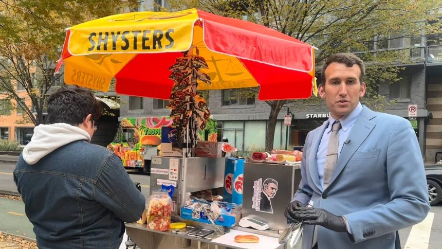 MatPat speaks at a public gathering in front of Congress.