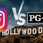 Woman biting into a sandwich while squinting her eyes