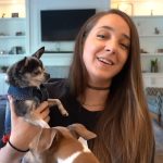 man hands out dog treats