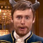 MrBeast holding giant bar of blue feastables chocolate