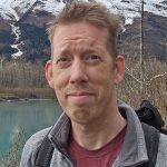 VSauce talking to camera with white t-shirt