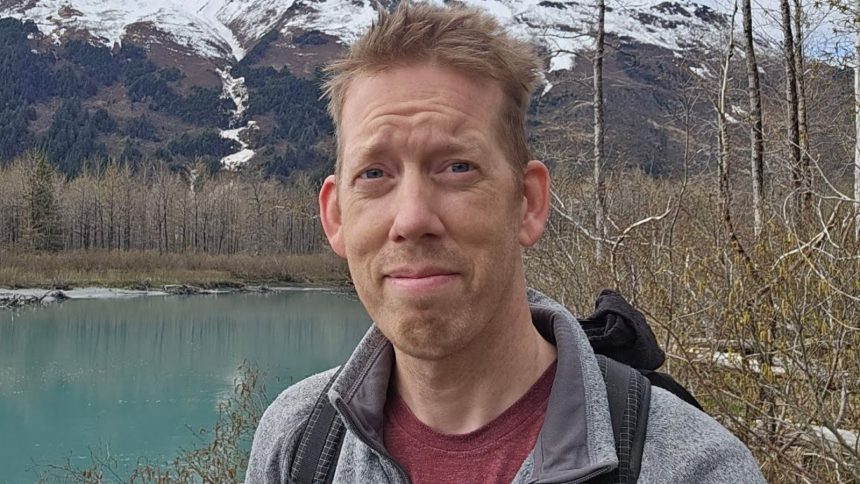 VSauce talking to camera with white t-shirt