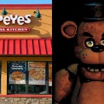 a man eating chicken from a kfc vending machine
