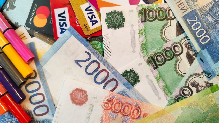 Ariel signs away her soul in The Little Mermaid next to a grinning Labubu doll.