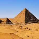 researchers inside the world's biggest spiderweb