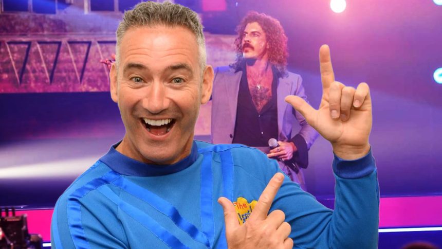 Woman biting into a sandwich while squinting her eyes