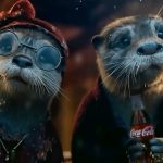 IShowSpeed in stripey t-shirt talking to camera in red chair