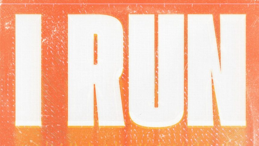 AI artist Xania Monet looking at camera while in pink seat