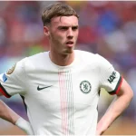 Why isn't Cole Palmer playing for Chelsea against Barcelona in the UEFA Champions League?