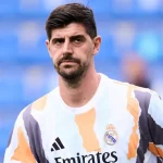 Why isn't Thibaut Courtois playing for Real Madrid vs. Olympiacos in the UEFA Champions League?