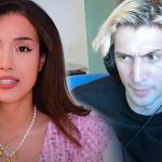 xqc wearing a grey hoodie streaming on twitch