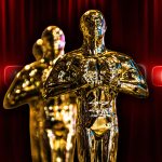 The Oscars trophy against a background of a red curtain and the YouTube logo.