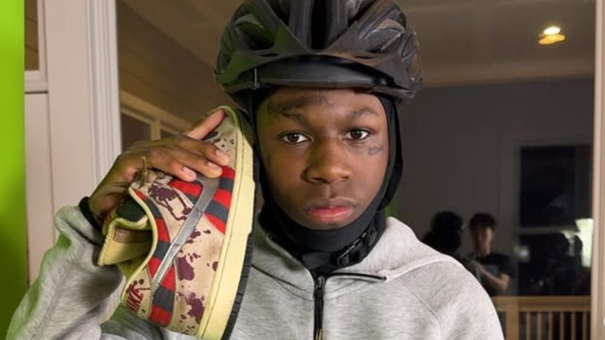 A photo of Sliker on top of the Twitch logo.