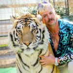 Tyrese Gibson holding a weapon.