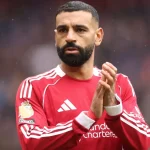 Why isn't Mohamed Salah playing for Liverpool against Tottenham in the Premier League?