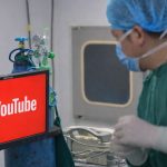 surgeon watching youtube video