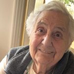 Grandma Mary smiling at camera on TikTok