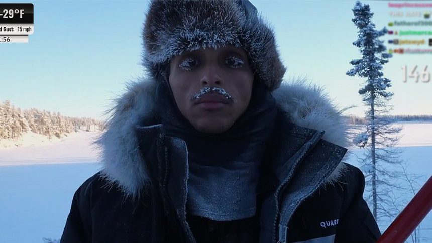 A photo of Agent in the North Pole with frosty eyelashes and facial hair.
