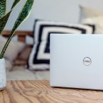 man rides horse through target