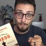 gothamchess holding his 'how to win at chess' book