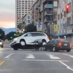 A screenshot of the moment two cars collided in DTLA as captured on Conner's Kick stream.