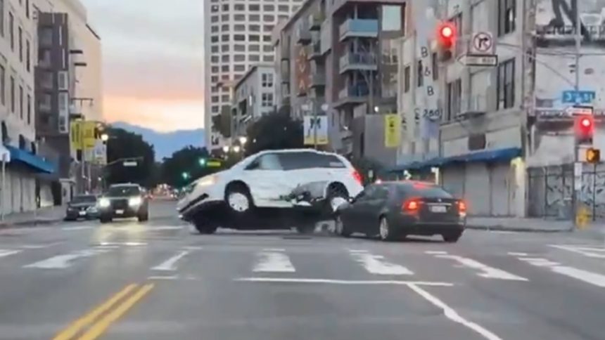 A screenshot of the moment two cars collided in DTLA as captured on Conner's Kick stream.