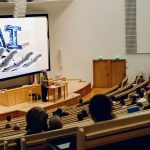 An image of a professor discussing AI